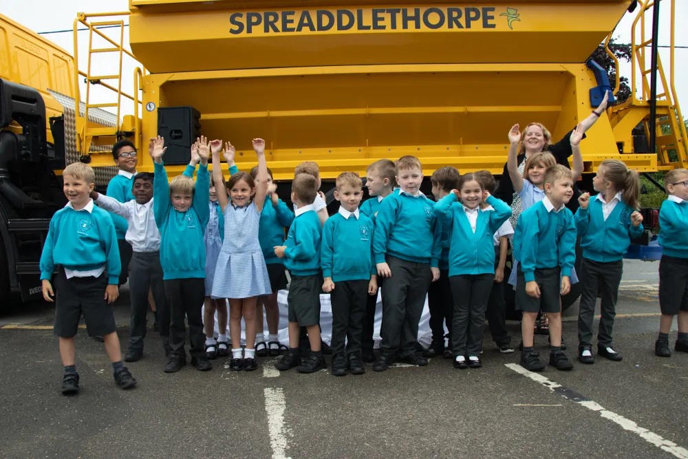 Pupils prepare to play sport.